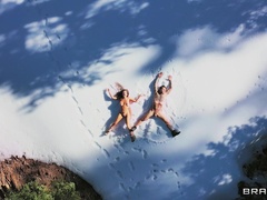 Outdoor sex in the snow for a tanned beauty with huge tits