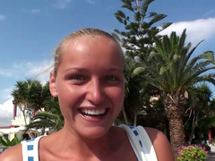 Foxy blond MILF dives in sky blue water wearing diving costume