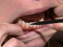 Ruined red-haired MILF gets her pussy lips stretched with metal pegs