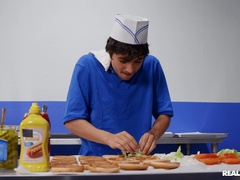 Linzee Ryder pleases a horny young boy in an industrial kitchen