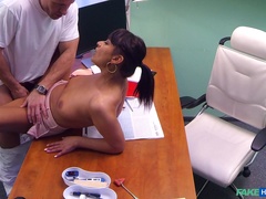 Doctor makes a young miss feel fantastic in the exam room