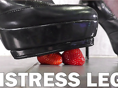 Mistress crushes juicy food with high heels and pantyhose