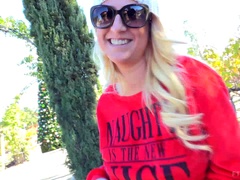 Blonde beauty teasing us by grabbing her large tits